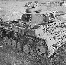 Panzer III knocked out by a Churchill during the Southern Horn attack The British Army in Tunisia 1943 NA836.jpg