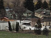 Distant film set with film members on snow