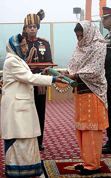 President Smt. Pratibha Devisingh Patil giving away the highest gallantry award Ashok Chakra to Smt. Beeta, widow of the Havildar Rajesh Kumar (posthumous) in New Delhi on January 26, 2010 The President, Smt. Pratibha Devisingh Patil giving away the highest gallantry award Ashok Chakra to Smt. Beeta wife of the Havildar Rajesh Kumar (posthumous) in New Delhi on January 26, 2010.jpg