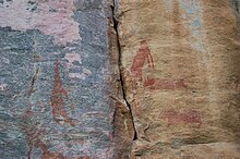 Faded red paintings at Tsodilo Tsodilo Hills rock paintings5.jpg