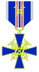 The cross of merit of customs service with a clasp, a typical Finnish branch-specific cross of merit. The cross is awarded by the minister responsible for customs for distinguished service or contributions to the customs service. A cross with a clasp may be awarded in special cases. Tullilaitoksen ansioristi soljen kera.png