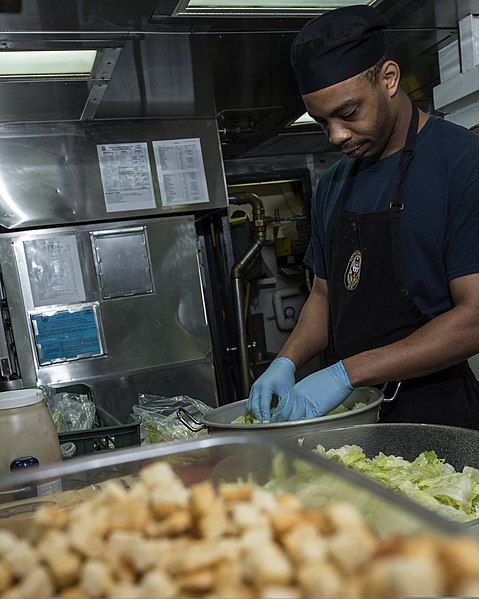 File:U.S. Navy Culinary Specialist 3rd Class Ontario Williams prepares salad aboard the guided missile cruiser USS Philippine Sea (CG 58) June 30, 2014, in the Persian Gulf 140630-N-PJ969-014.jpg