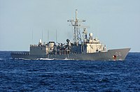 US Navy 040720-N-7732W-210 The Australian Navy Frigate Newcastle (FFG 06) cruises with USS John C. Stennis (CVN 74) as she conducts plane guard duties.jpg