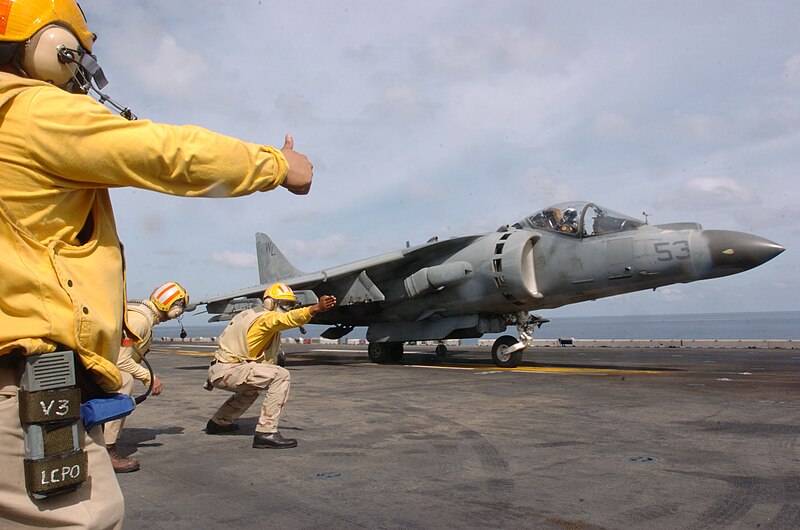 File:US Navy 061029-N-2970T-008 Chief Aviation Boatswain's Mate Marc Hermosura gives the clear to launch signal.jpg