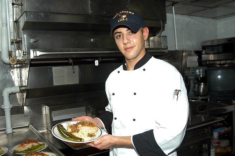 File:US Navy 070213-N-7029R-021 Culinary Specialist 3rd Class Joseph Chiarelli shows off a dish he prepared for the Emeril Live Show.jpg