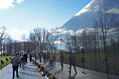US flag reflexion on Vietnam Veterans Memorial 12 2011 000124.JPG
