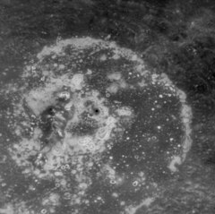 Closeup of Warhol at high sun angle showing the abundant hollows on the crater floor (MESSENGER NAC)