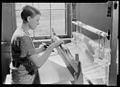 "Alice McCarter, weaving a baby blanket at the Pi Beta Phi School, Gatlinburg, Tennessee. This particular material is... - NARA - 532764.jpg