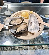 Raw "Fine de Claire" oysters served at Mercado de San Miguel in Madrid.
