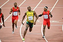 Momento final de los 100 m en el Campeonato Mundial de Atletismo 2015 en Beijing.jpg