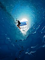 An exposed glacier tube that once transported water down the interior of the glacier.