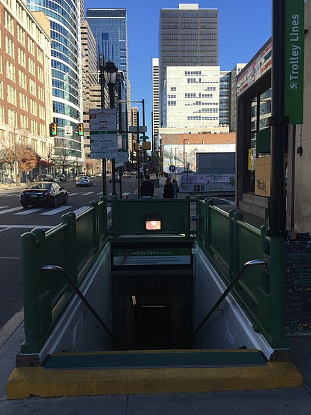 Eastbound platform entrance with the site of the 2013 Philadelphia building collapse in the background.