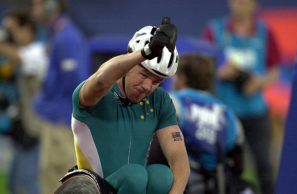 In Paralympic sport, Australia has been most successful in Athletics. Greg Smith gives the crowd a "thumbs up" after winning gold at the 800 m T52 fin