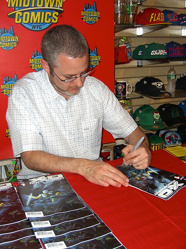 Writer Robert Venditti signing copies of Valiant Entertainment's debut issue of the series at a May 2, 2012 signing at Midtown Comics in Manhattan