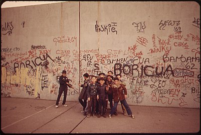 Children playing on sidewalk in 1973