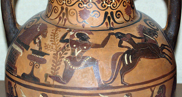 Achilles seizing Troilus by the hair as the youth attempts to flee the ambush at the fountain. Etruscan amphora of the Pontic group, ca. 540–530 BC. F