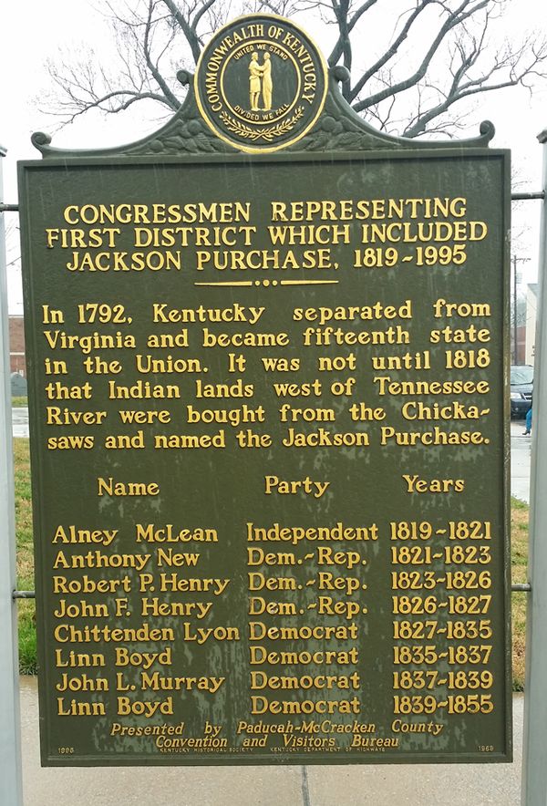 Sign in front of the McCracken, Kentucky Courthouse (in Paducah, Kentucky) commemorating early members of the U.S. House of Representatives representi