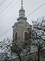 Turnul baroc al bisericii greco-catolice Sf. Dumitru din Beiuș (vedere dinspre Colegiul Național Samuil Vulcan)