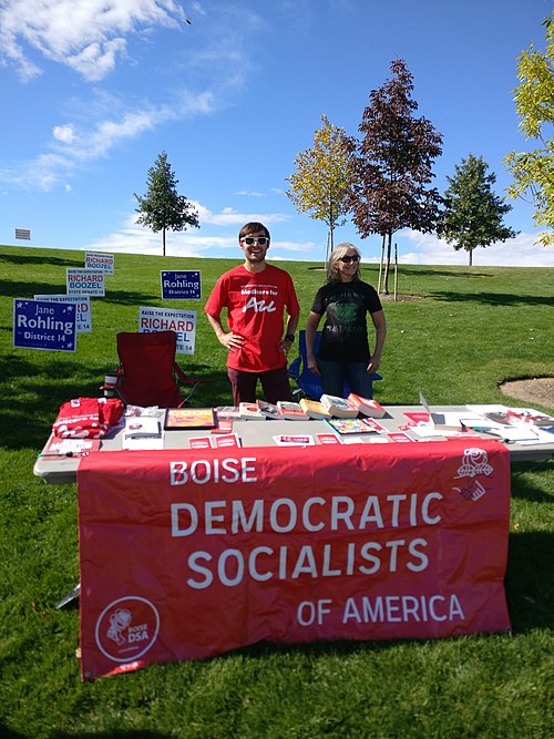 Two founding Idahoan DSA members at a big tent event in late September 2018