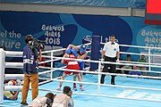 Deutsch: Boxen bei den Olympischen Jugendspielen 2018 Tag 12, 18. Oktober 2018 - Kampf um die Bronzemedaille im Fliegengewicht Mädchen – Heaven Destiny Garcia (USA, blau) schlägt Goryanana Stoeva (Bulgarien, rot) 5-0; Ringrichter ist Ishanguly Meretnyyazov (Turkmenistan). English: Boxing at the 2018 Summer Youth Olympics on 18 October 2018 – Girl's flyweight Bronze Medal Bout - Heaven Destiny Garcia (USA, blue) beats Goryanana Stoeva (Bulgaria, red) 5-0; Referee is Ishanguly Meretnyyazov (Turkmenistan). Español: Boxeo en los Juegos Olímpicos Juveniles de Verano de 2018 en 18 de octubre de 2018 - Combate a medalla de bronce de peso mosca para mujeres: Heaven Destiny Garcia (Estados Unidos, azul) le gana a Goryanana Stoeva (Bulgaria, roja) 5-0; El árbitro es Ishanguly Meretnyyazov (Turkmenistán).