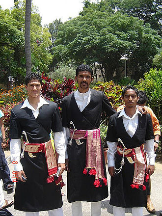 The Kodavas with the pichangatti slipped behind the waist band. Coorgi Trditional Dress.jpg