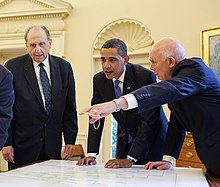 Dallin H. Oaks (right) with LDS Church president Thomas S. Monson (left) and U.S. President Barack Obama (center) in the Oval Office on July 20, 2009, presenting a personal volume of President Obama's genealogy as a gift from the LDS Church. Dallin Oaks.jpg