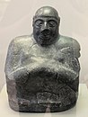 Estátua de diorito de Lupade, oficial na cidade de Uma, feita no início do Terceiro Período Dinástico, atualmente no Museu do Louvre