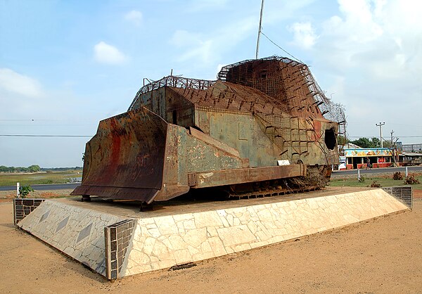Improvised armoured bulldozer used by the LTTE in the operation Aakaya Kadal Veli, also known as the First Battle of Elephant Pass (1991), one of the major battles. This bulldozer was destroyed by Cpl. Gamini Kularatne. Today it stands on display as a war memorial.