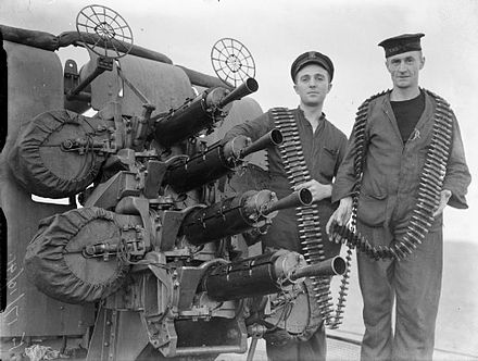A .5-inch Mk. III, four-gun anti-aircraft mount and its crew on the cruiser HMS London in 1941