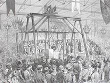 Arthur Sullivan conducts his Imperial Ode as Queen Victoria lays the foundation stone, 1887 Imperial Ode.jpg