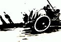 Reportážní fotografie: Jacques-Henri Lartigue: Automobil Delage na Grand Prix ACF, 1912; pohybové zkreslení bylo způsobenou štěrbinovou závěrkou