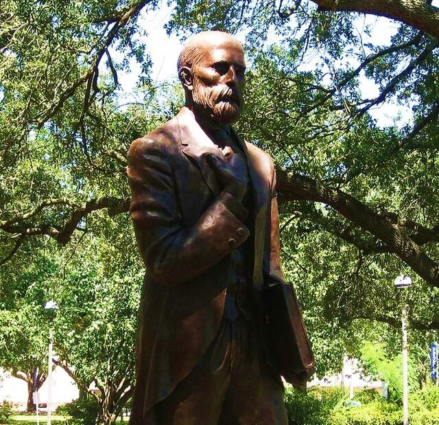 Statue of John McNeese on the campus. McNeese, a regional pioneer educator, is the namesake of the university.