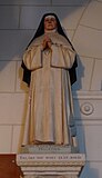 Statue de sainte Marie-Euphrasie Pelletier dans l'église des Verchers-sur-Layon.