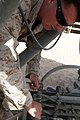 Marines inspect satellite in Afghanistan (4525477521).jpg
