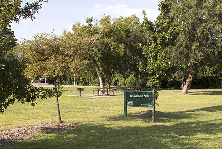 Park sign and grills.