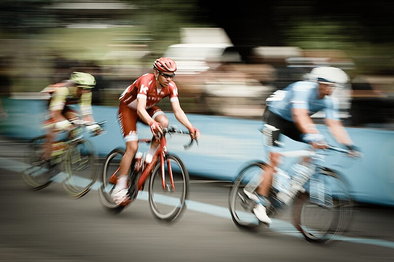 File:Men cycling in Turin city (Unsplash).jpg