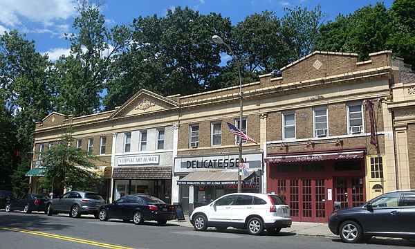 A block of shops on Douglaston Parkway; the National Art League occupies part of this block