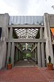 An open air corridor separating two retail complexes on the north of Campbell Avenue. Located immediately west of 4029 Campbell Avenue, Arlington, VA, looking north.