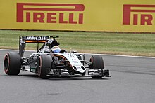 Sergio Perez driving the newly introduced Force India VJM08B. Perez Force India VJM08B Britain 2015.jpg