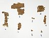 Eight fragments of a papyrus manuscript lettered a to h