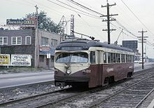 Route 103 trolley on West Chester Pike in 1964 PSTC 22 (PCC) on Ardmore Rail Division along West Chester Pike, near Llanerch Shops in Upper Darby, August 1964.jpg