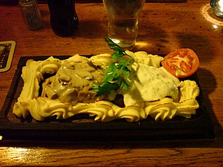 Fatányéros Traditional Hungarian mixed meat barbecue dish