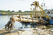 The dredge drag head of a suction dredge barge on the Vistula River in Warsaw, Poland Poglebiarka ,,Sawa", glowica, Wisla, Saska Kepa, Warszawa 3.jpg