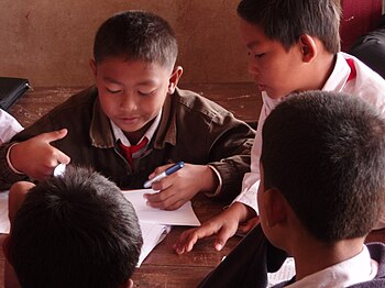 Primary pupils in group work in a small villag...