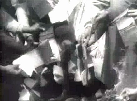 Demonstrators discarding their passbooks to protest apartheid, 1960