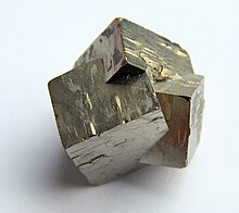 Twinned pyrite crystal group. Pyrite 60608.jpg