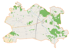 Mapa konturowa gminy Rusiec, blisko centrum na prawo znajduje się punkt z opisem „Rusiec”