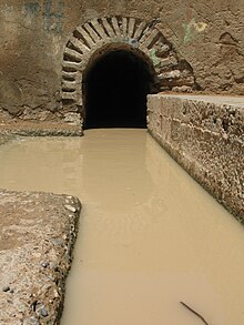 A khettara emerging at the surface near Rissani (Tafilalt region) SORTIE DE LA KHETTARA DE HAROUN.JPG