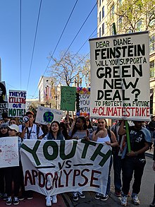 Marchers holding a banner with the words "Youth vs Apocalypse". San Francisco Youth Climate Strike - March 15, 2019. San Francisco Youth Climate Strike - March 15, 2019 - 29.jpg