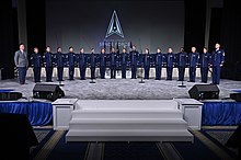 Members of the United States Air Force Band and a guest singer give the first public performance of "Semper Supra" at National Harbor, Maryland, on September 20, 2022. Semper Supra US Air Force Band National Harbor 20 Sep 2022.jpg